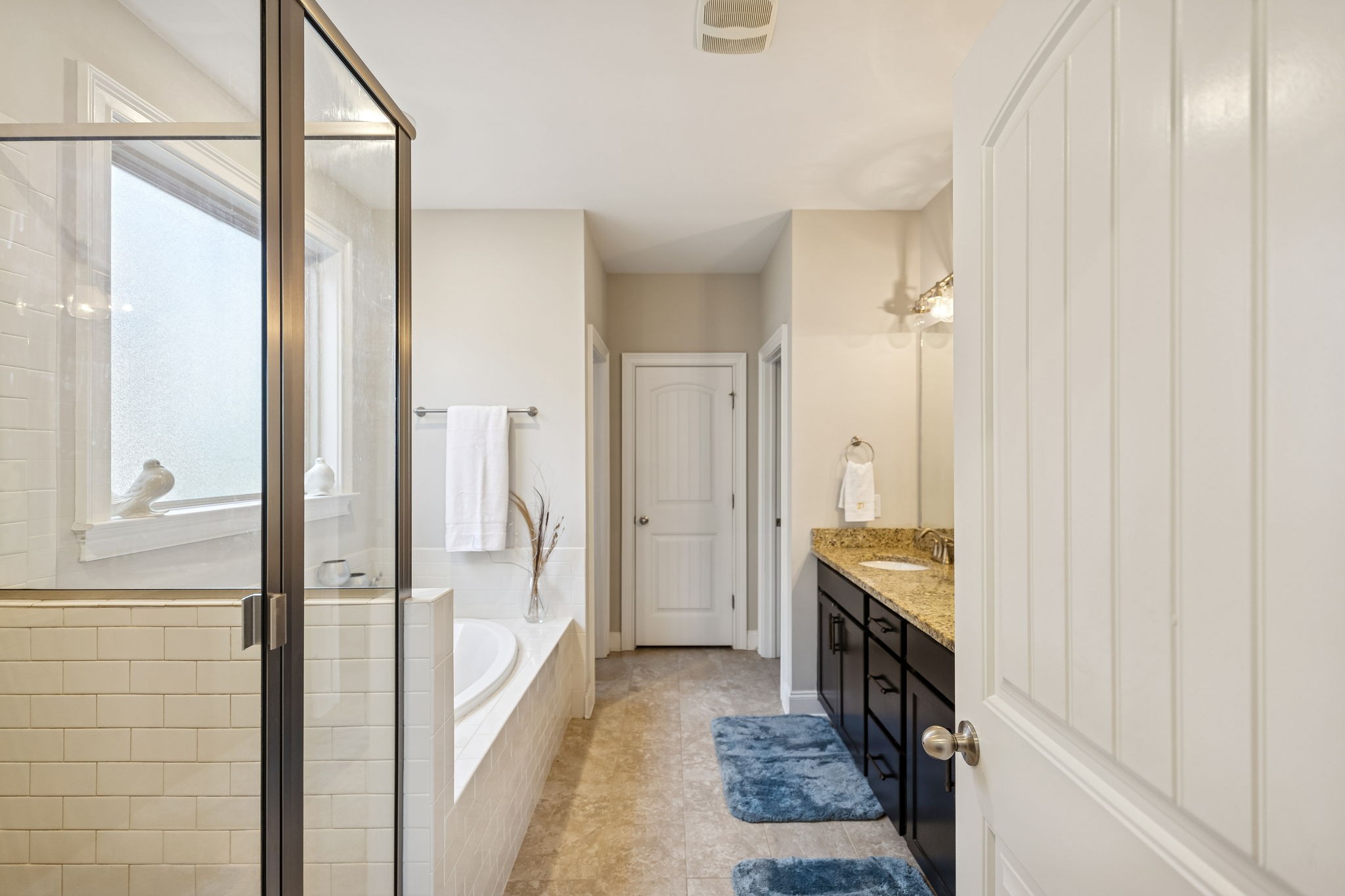 1167 Batbriar Road Murfreesboro, TN 37128 - Photo 11 of 22 a bathroom with a double vanity sink and a mirror