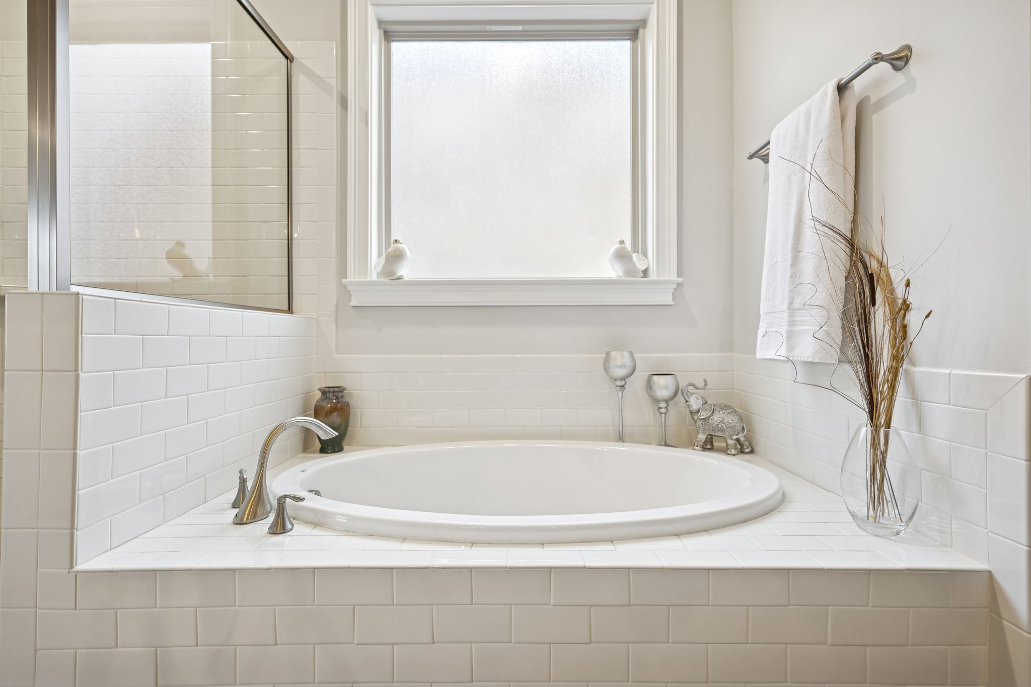 1167 Batbriar Road Murfreesboro, TN 37128 - Photo 12 of 22 a bathroom with bathtub a window and a sink