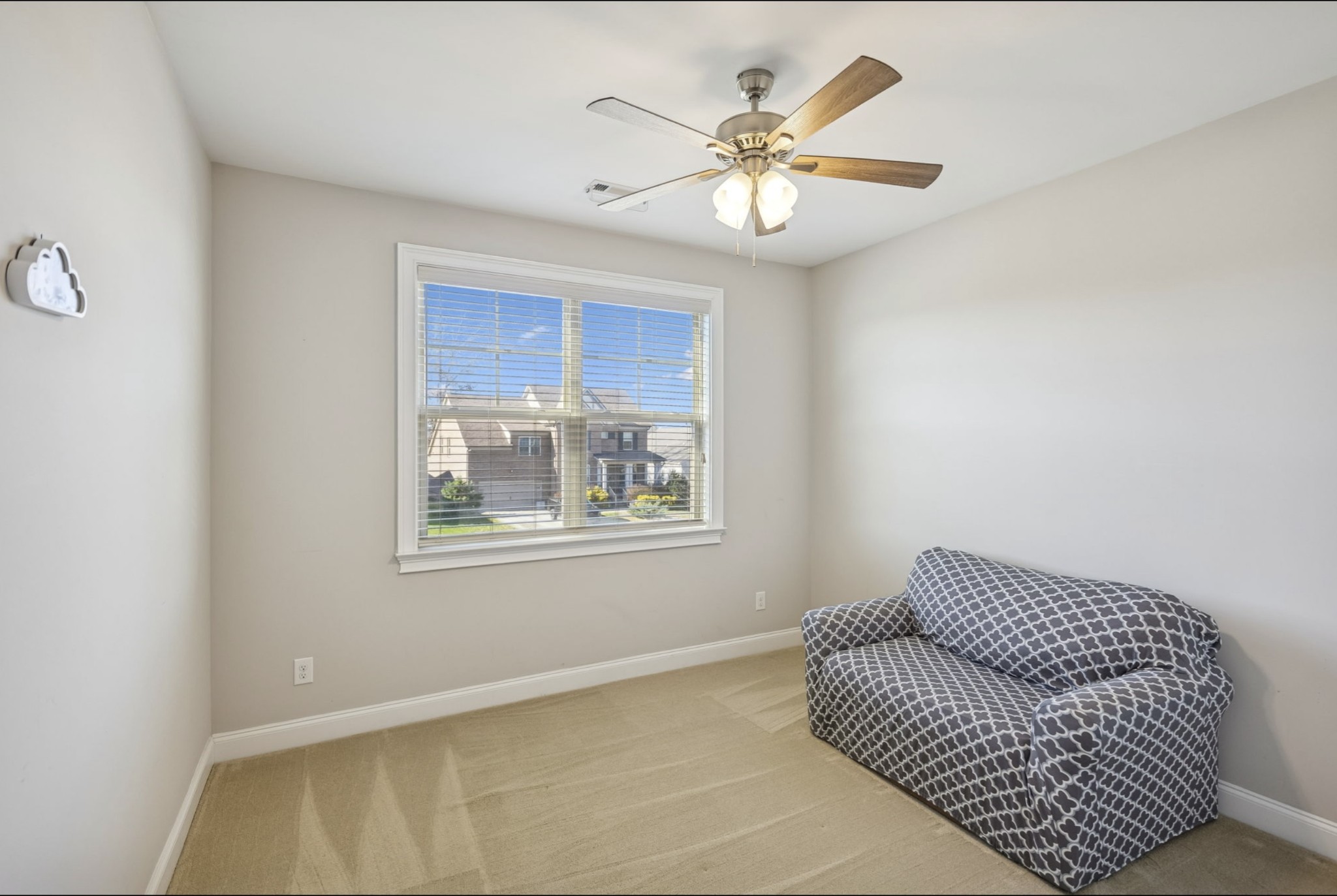 1167 Batbriar Road Murfreesboro, TN 37128 - Photo 15 of 22 a living room with furniture and a chandelier