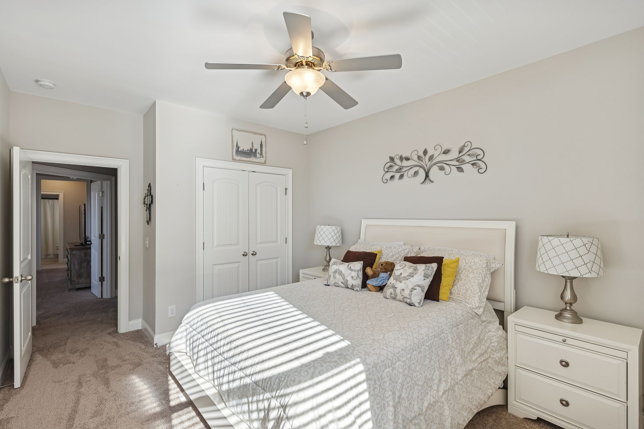 1167 Batbriar Road Murfreesboro, TN 37128 - Photo 17 of 22 a bedroom with a bed and a lamp on the dresser