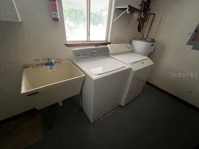 7670 Southwest 112th Lane Ocala, FL 34476 - Photo 11 of 16 a utility room with dryer and washer