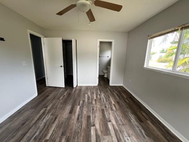 7670 Southwest 112th Lane Ocala, FL 34476 - Photo 15 of 16 a view of hallway with wooden floor and window