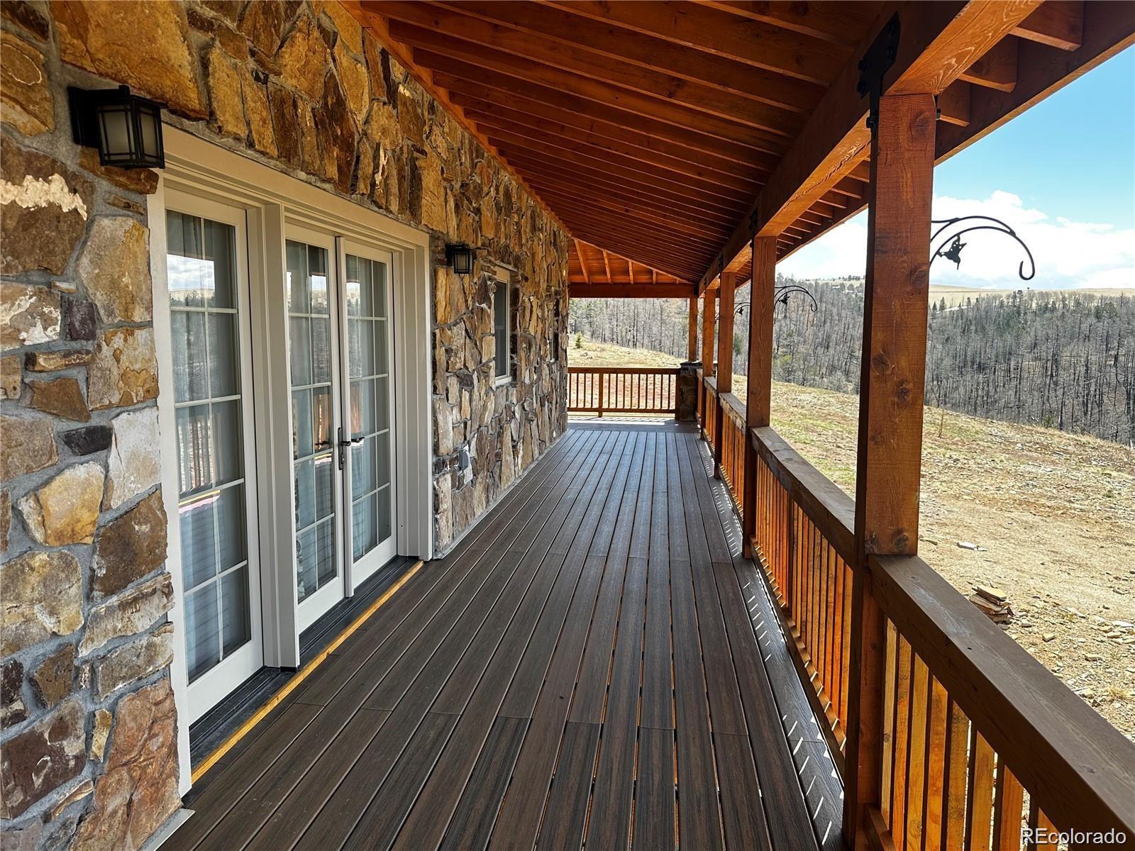 406-449 Schierl Road Fort Garland, CO 81133 - Photo 6 of 50 a view of balcony with wooden floor