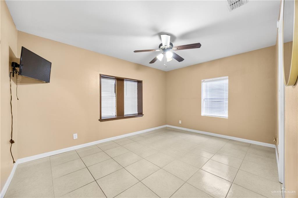 304 South 27th Street McAllen, TX 78501 - Photo 8 of 21 a view of an empty room with a window