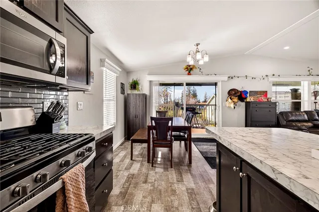 a kitchen with a stove and cabinets