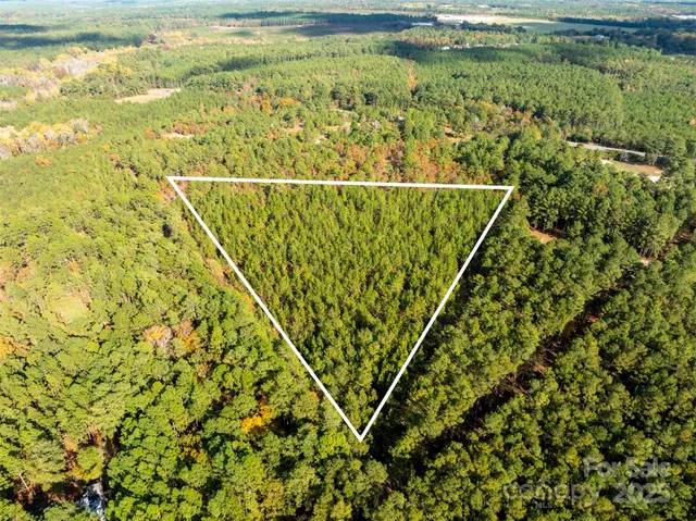 a view of a yard with an outdoor space