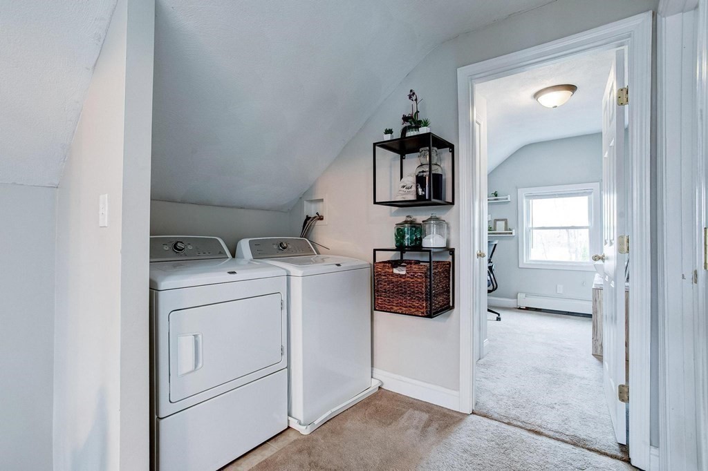 54 Pine Street Stoneham, MA 02180 - Photo 16 of 30 a utility room with dryer and washer