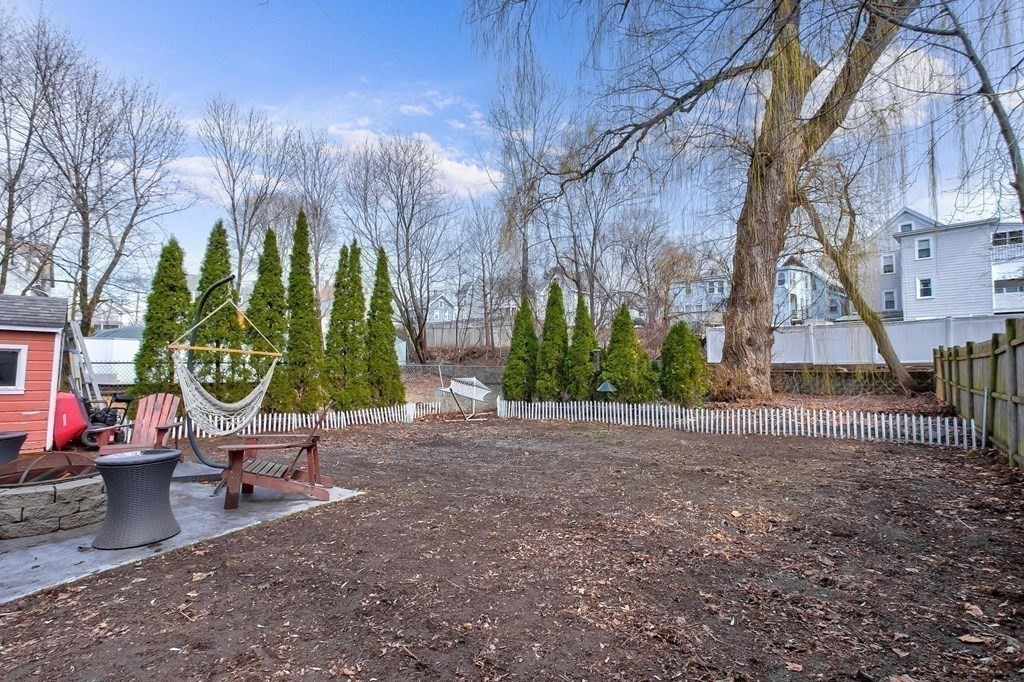 54 Pine Street Stoneham, MA 02180 - Photo 26 of 30 a view of a street with sitting area