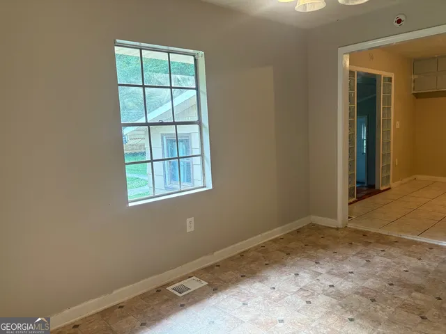 an empty room with a window