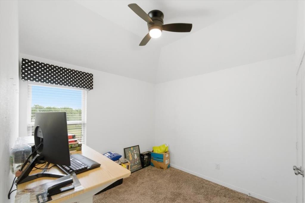 10701 Kestrel Court Waco, TX 76708 - Photo 16 of 37 Additional bedroom with vaulted ceiling and ceiling fan