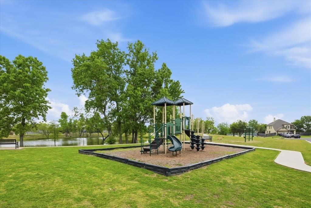 10701 Kestrel Court Waco, TX 76708 - Photo 35 of 37 Community play area featuring a playground set and swing set