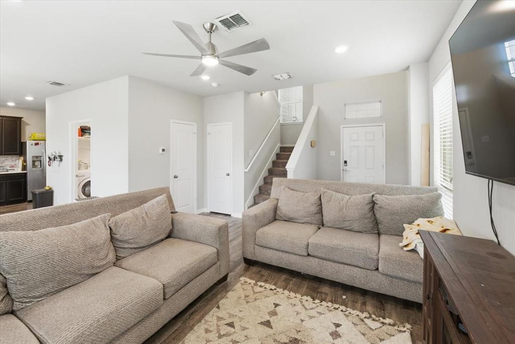 10701 Kestrel Court Waco, TX 76708 - Photo 6 of 37 Living room with a ceiling fan, light wood-look flooring, and recessed LED lighting