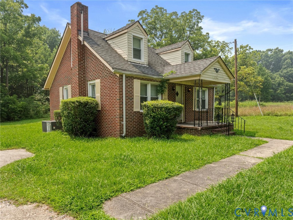 1593 Yellowbird Road Blackstone, VA 23824 - Photo 2 of 9 Brick and siding exterior featuring a covered fron