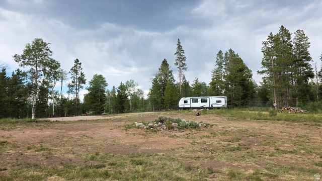 38 Spruce, Unit 38A Evanston, UT 82930 - Photo 3 of 15 Expansive cleared lot surrounded by mature evergreen and deciduous trees