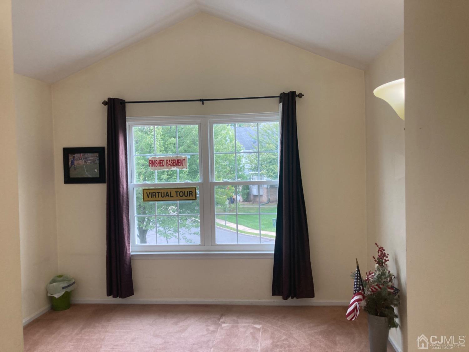 310 Hawthorne Road North Brunswick, NJ 08902 - Photo 21 of 25 an empty room with windows