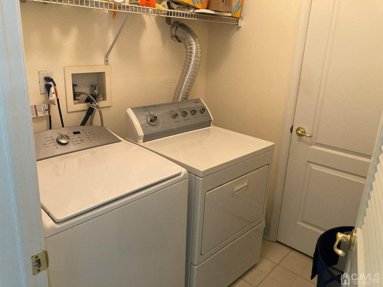 310 Hawthorne Road North Brunswick, NJ 08902 - Photo 24 of 25 a utility room with dryer and washer