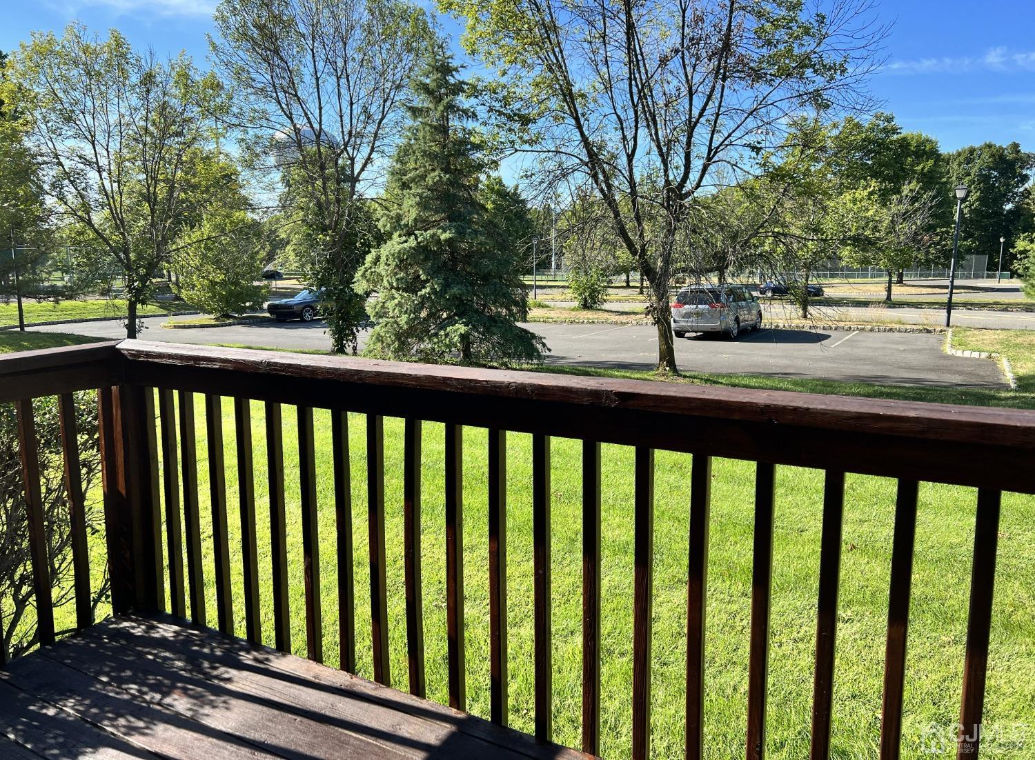 310 Hawthorne Road North Brunswick, NJ 08902 - Photo 5 of 25 a view of a street with trees in front of it