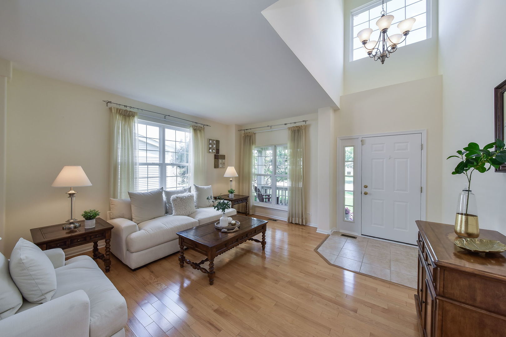 1699 Montclair Drive Elgin, IL 60123 - Photo 12 of 30 a living room with furniture and wooden floor