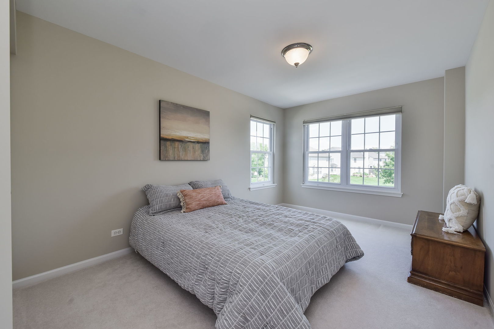 1699 Montclair Drive Elgin, IL 60123 - Photo 20 of 30 a bedroom with bed and window