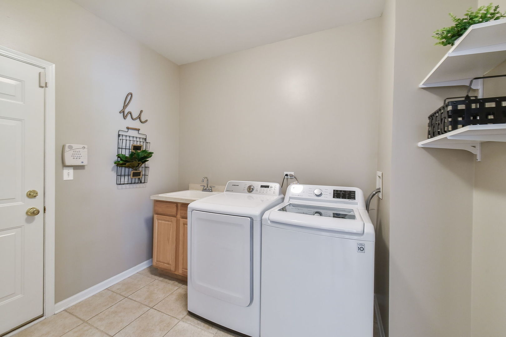 1699 Montclair Drive Elgin, IL 60123 - Photo 23 of 30 a view of storage and utility room with washer and dryer