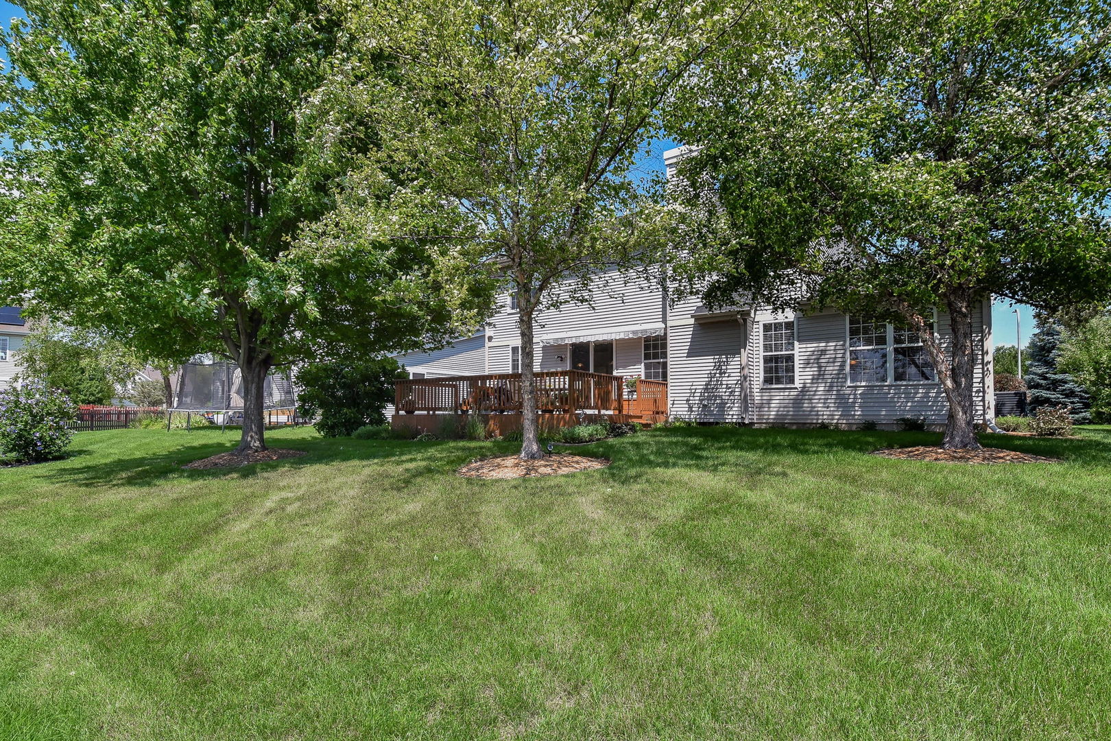 1699 Montclair Drive Elgin, IL 60123 - Photo 27 of 30 a view of a house with a backyard
