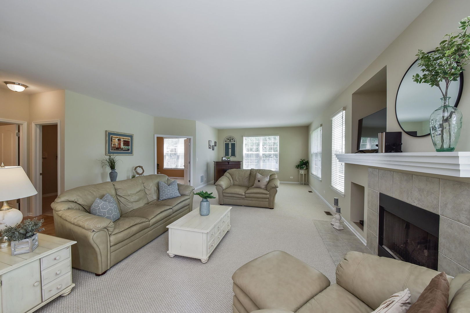 1699 Montclair Drive Elgin, IL 60123 - Photo 7 of 30 a living room with furniture and a fireplace