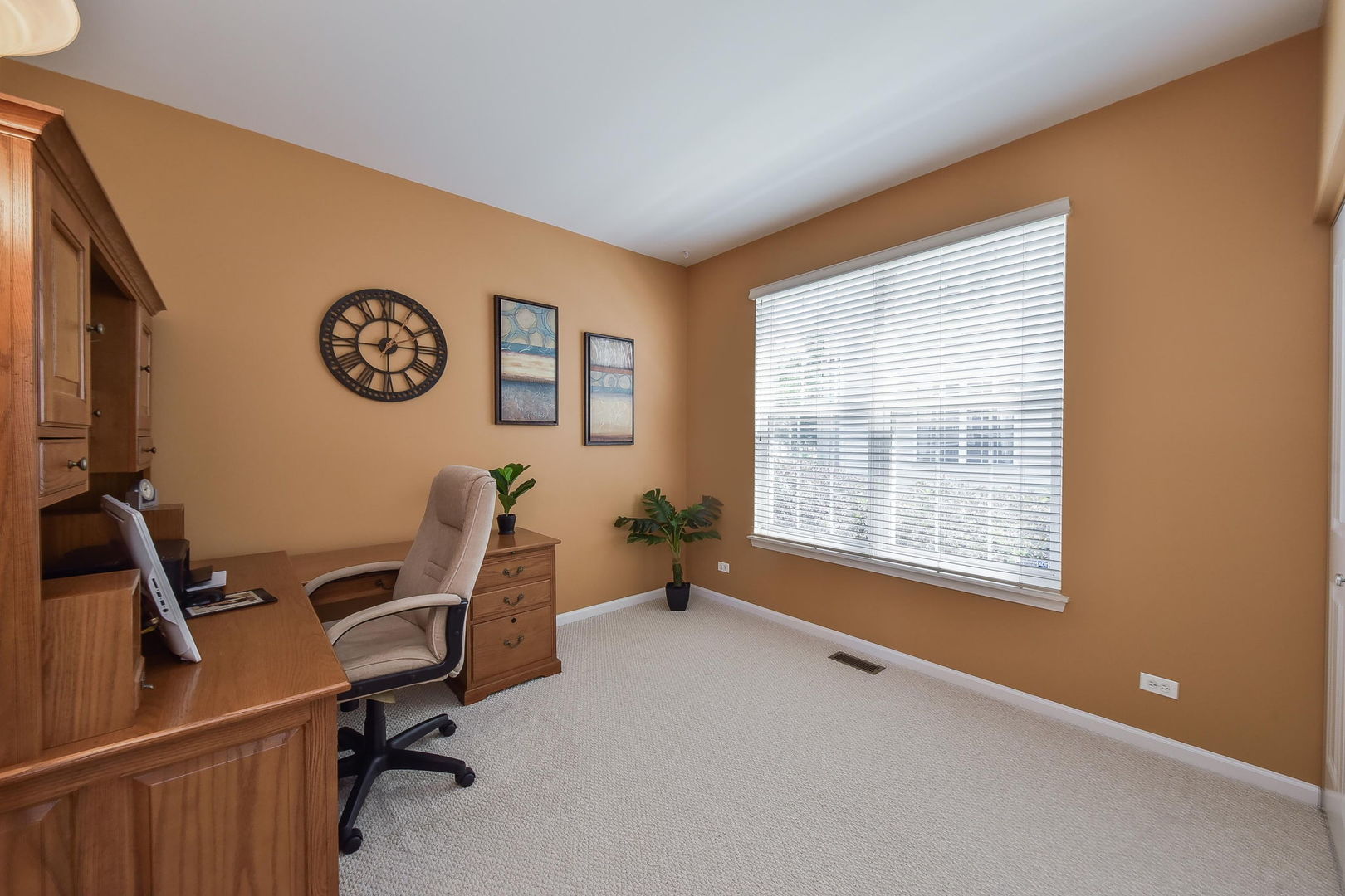1699 Montclair Drive Elgin, IL 60123 - Photo 9 of 30 a view of a workspace with furniture and a window