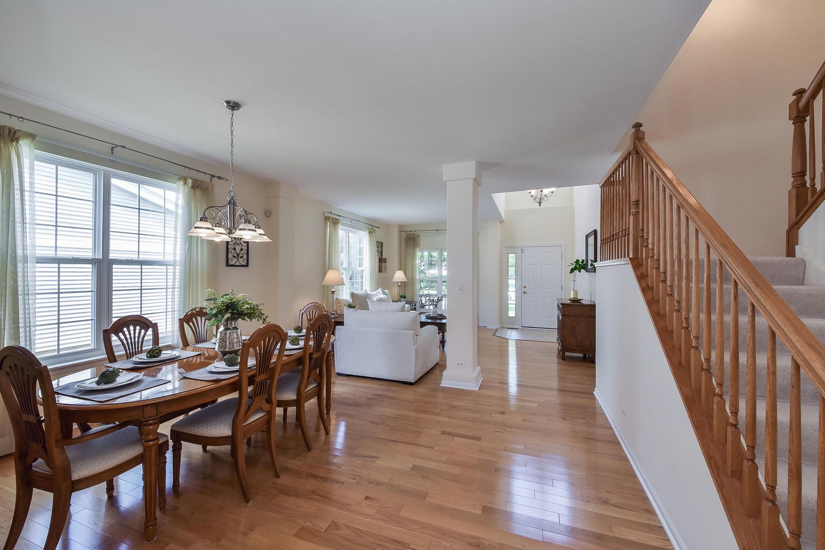 1699 Montclair Drive Elgin, IL 60123 - Photo 10 of 30 a view of a dining room with furniture and wooden floor