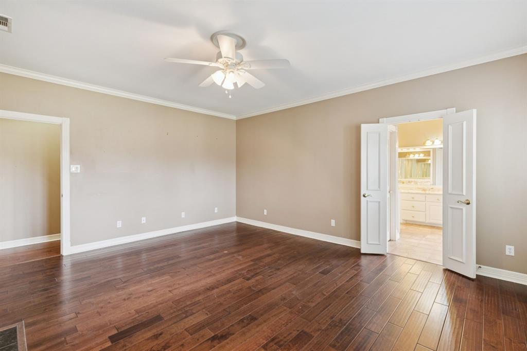 1250 Eubanks Road Seagoville, TX 75159 - Photo 22 of 40 Oversized primary bedroom with on suite bathroom.