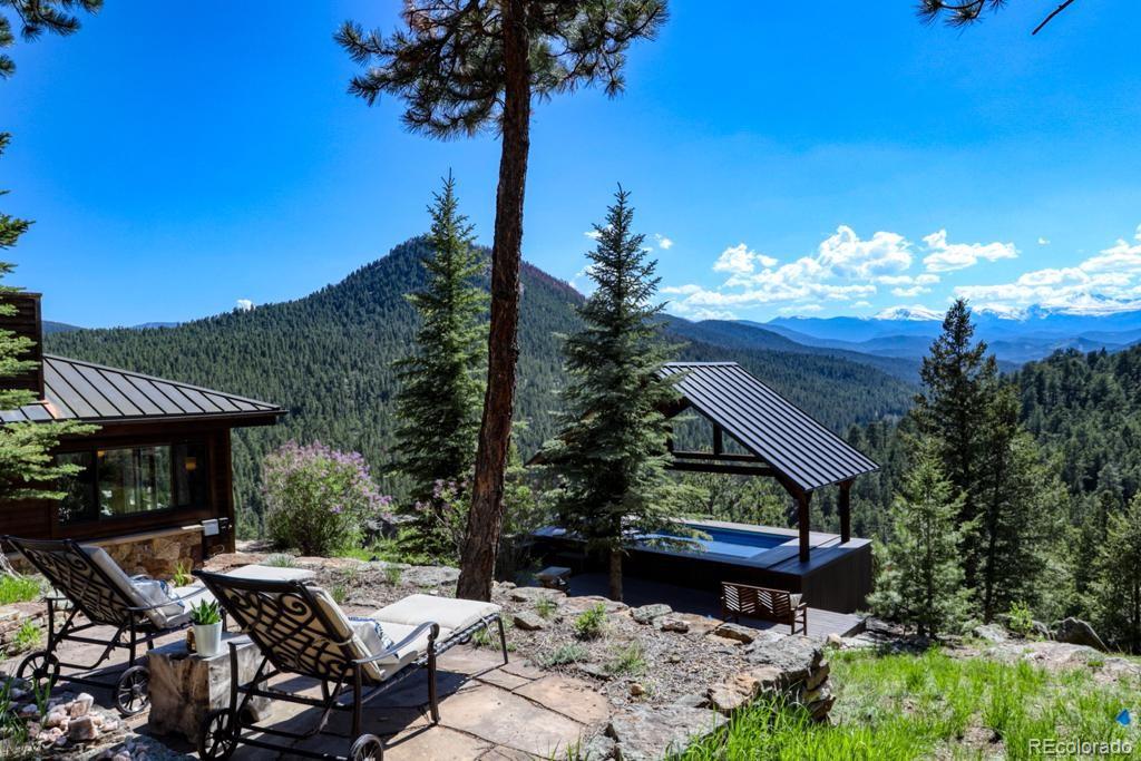 3731 Overlook Trail Evergreen, CO 80439 - Photo 16 of 35 a view of a patio in backyard