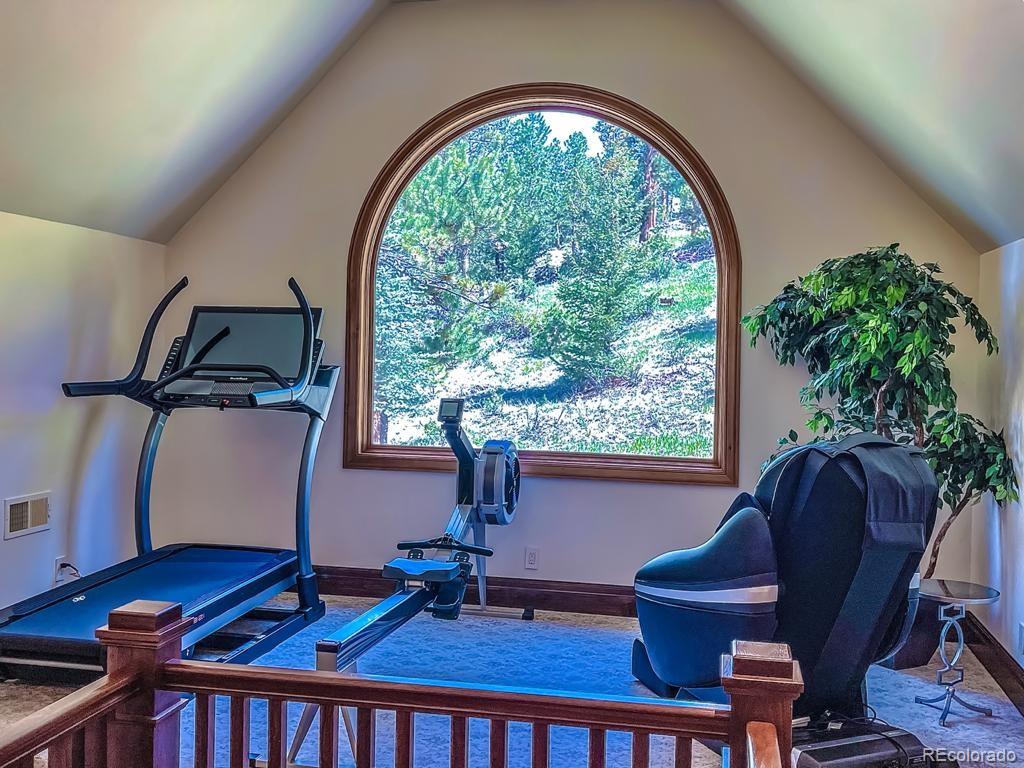 3731 Overlook Trail Evergreen, CO 80439 - Photo 23 of 35 a workspace with furniture and a window