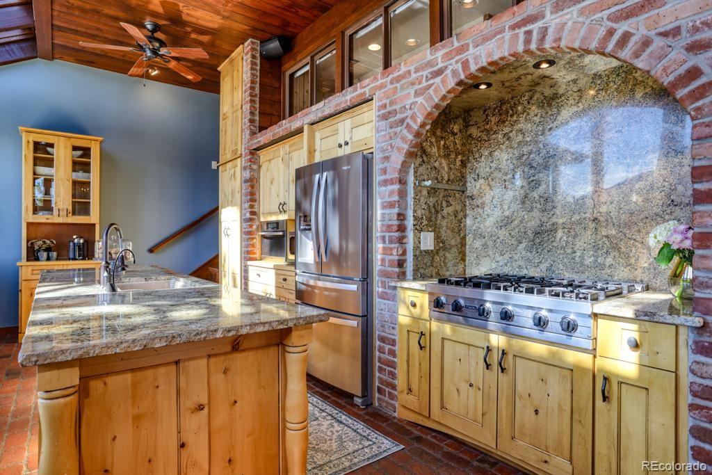 3731 Overlook Trail Evergreen, CO 80439 - Photo 8 of 35 a view of a kitchen with utility appliances