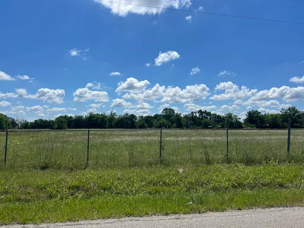a view of a golf course with a yard