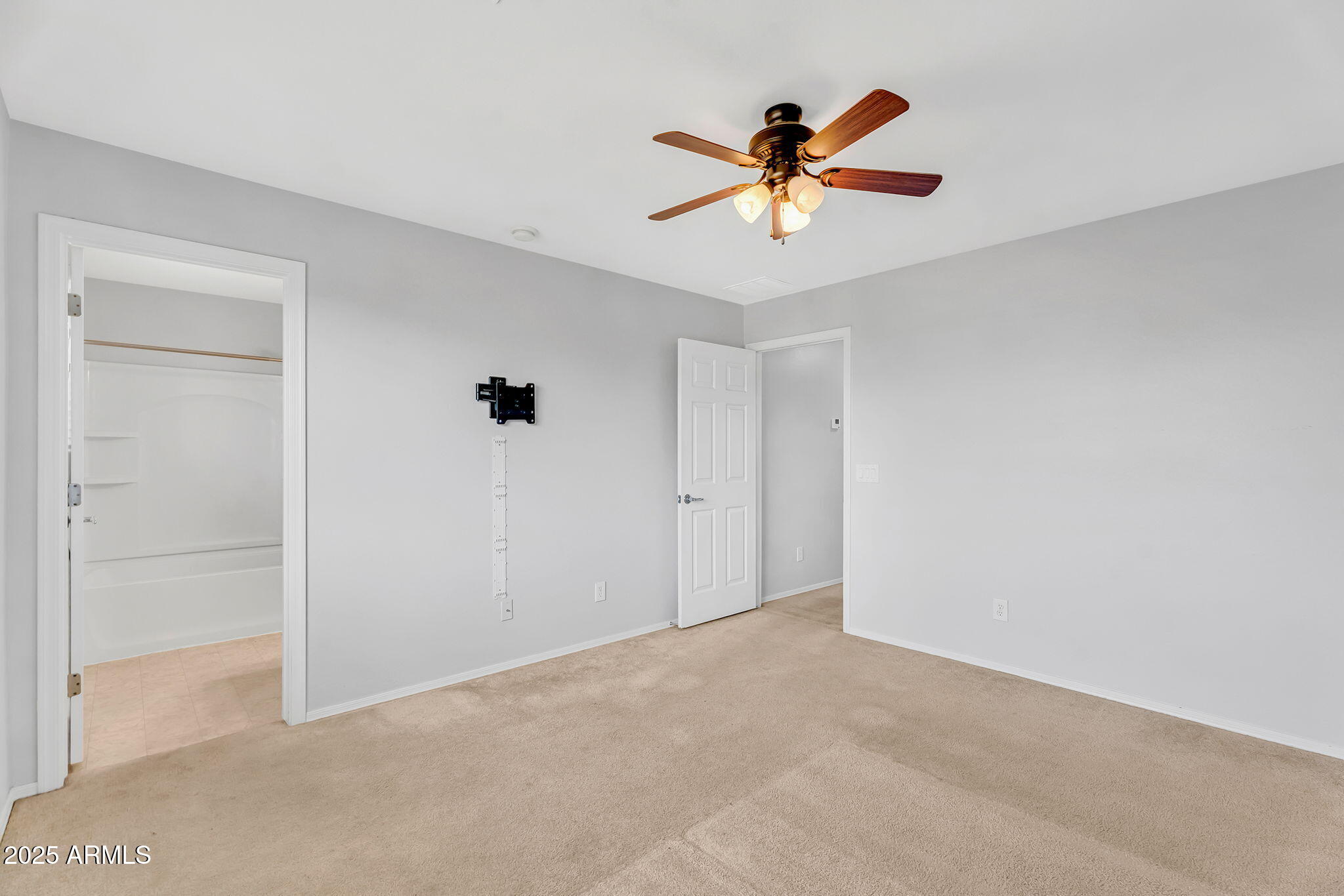 8071 West Georgetown Way Florence, AZ 85132 - Photo 16 of 43 a view of a livingroom with a ceiling fan and window