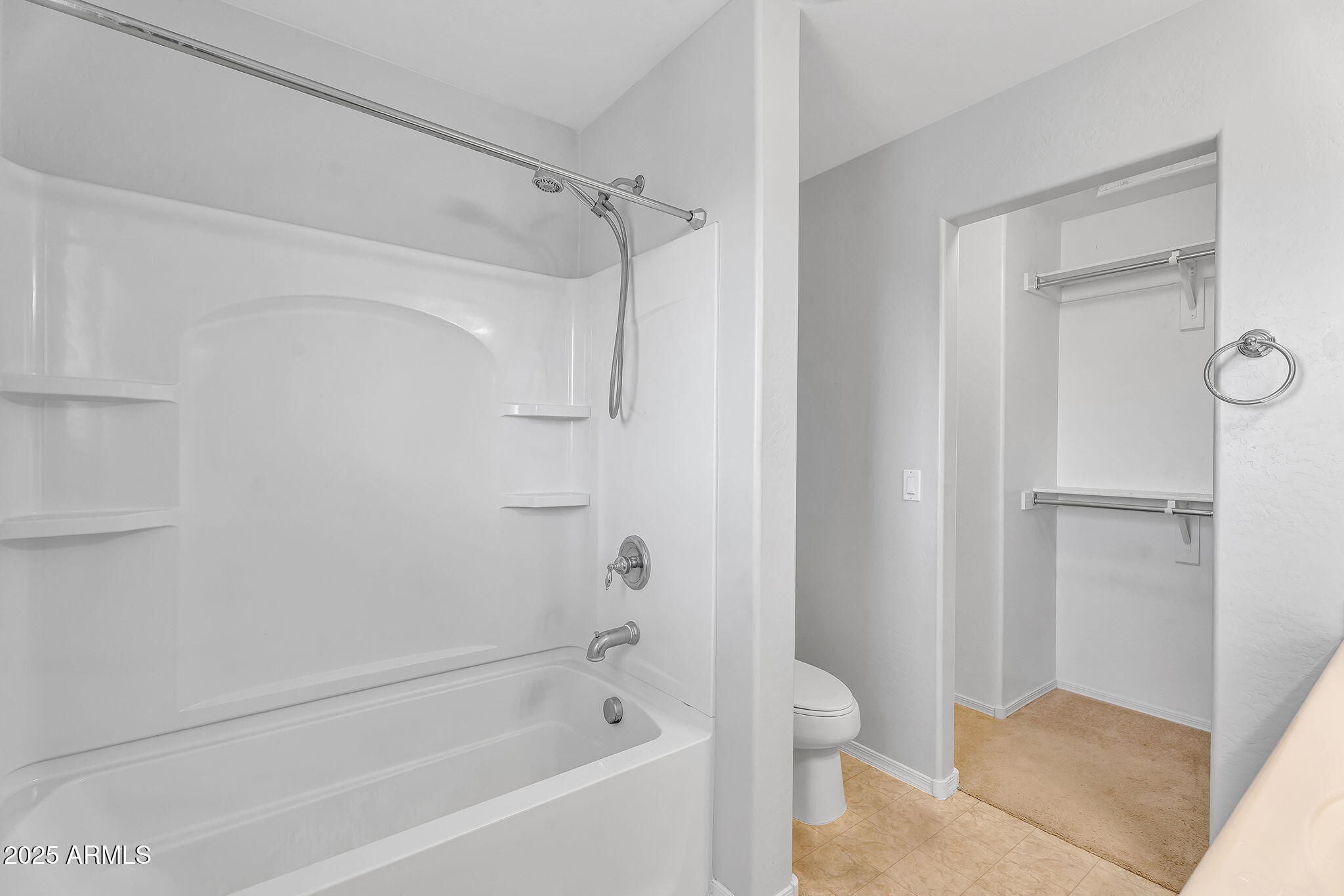 8071 West Georgetown Way Florence, AZ 85132 - Photo 19 of 43 a bathroom with a bathtub and a shower