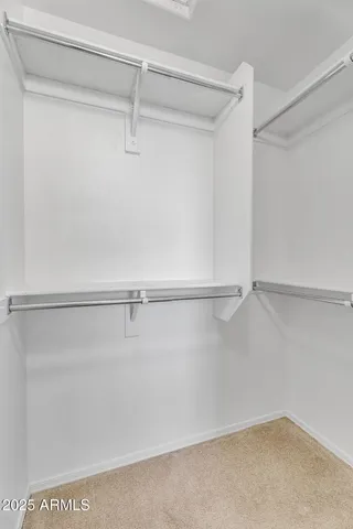 a view of a room with racks on the wall