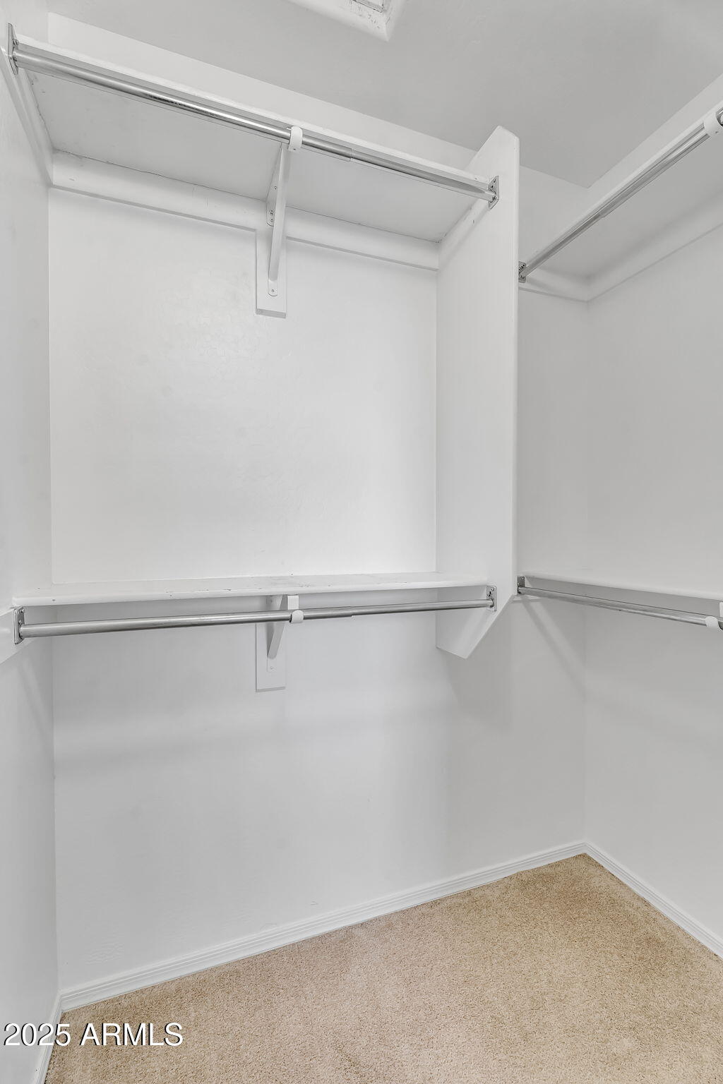 8071 West Georgetown Way Florence, AZ 85132 - Photo 20 of 43 a view of a room with racks on the wall