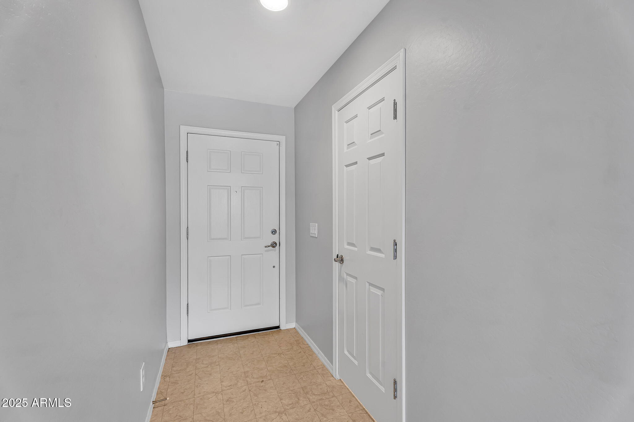8071 West Georgetown Way Florence, AZ 85132 - Photo 6 of 43 a view of a hallway with wooden floor and closet