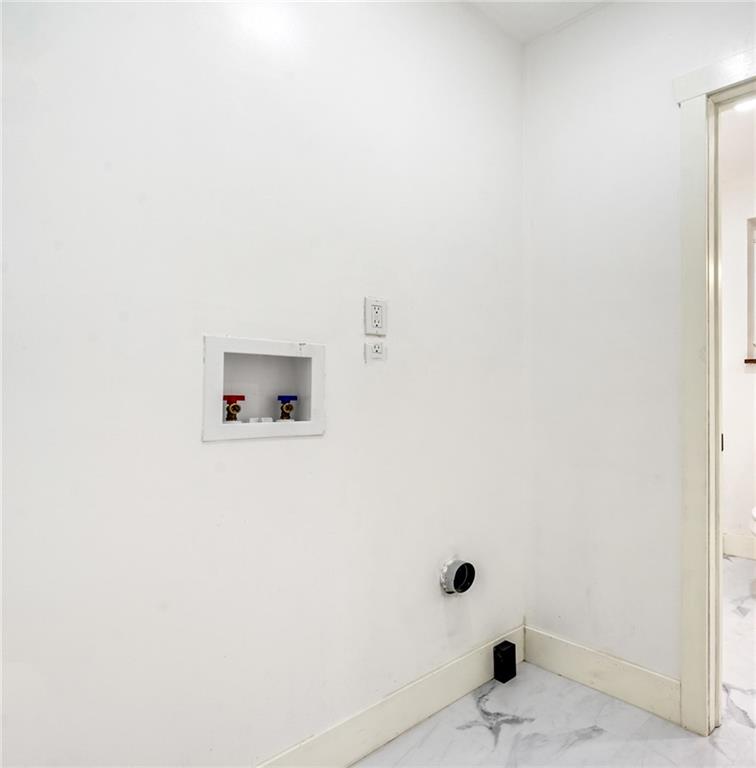 8619 Westwood Road Pittsburgh, PA 15235 - Photo 15 of 26 a bathroom with a window