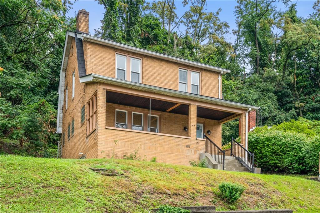 8619 Westwood Road Pittsburgh, PA 15235 - Photo 2 of 26 a view of a house with a yard