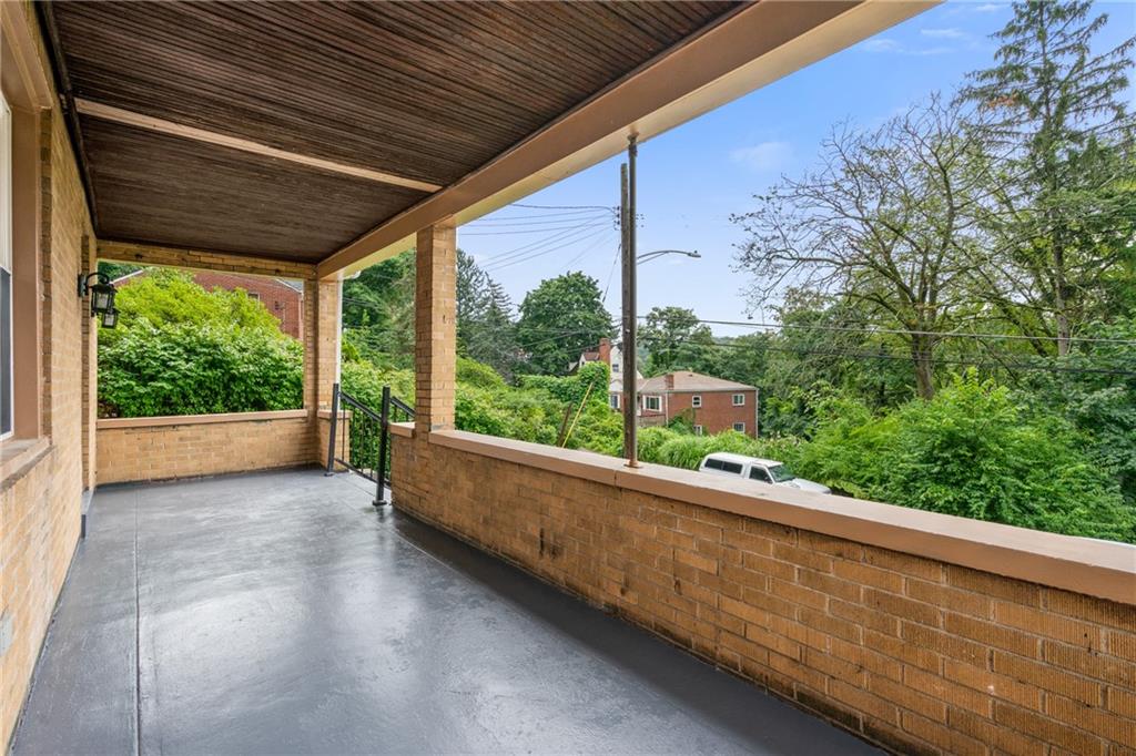 8619 Westwood Road Pittsburgh, PA 15235 - Photo 4 of 26 a view of a room with a large trees and plants