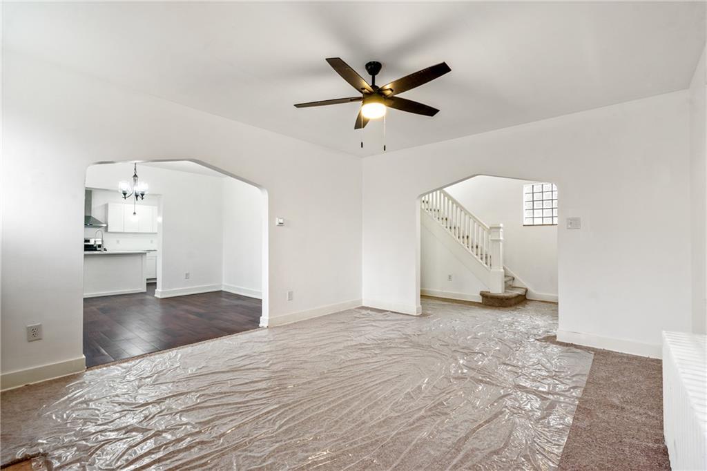 8619 Westwood Road Pittsburgh, PA 15235 - Photo 7 of 26 a view of empty room with wooden floor