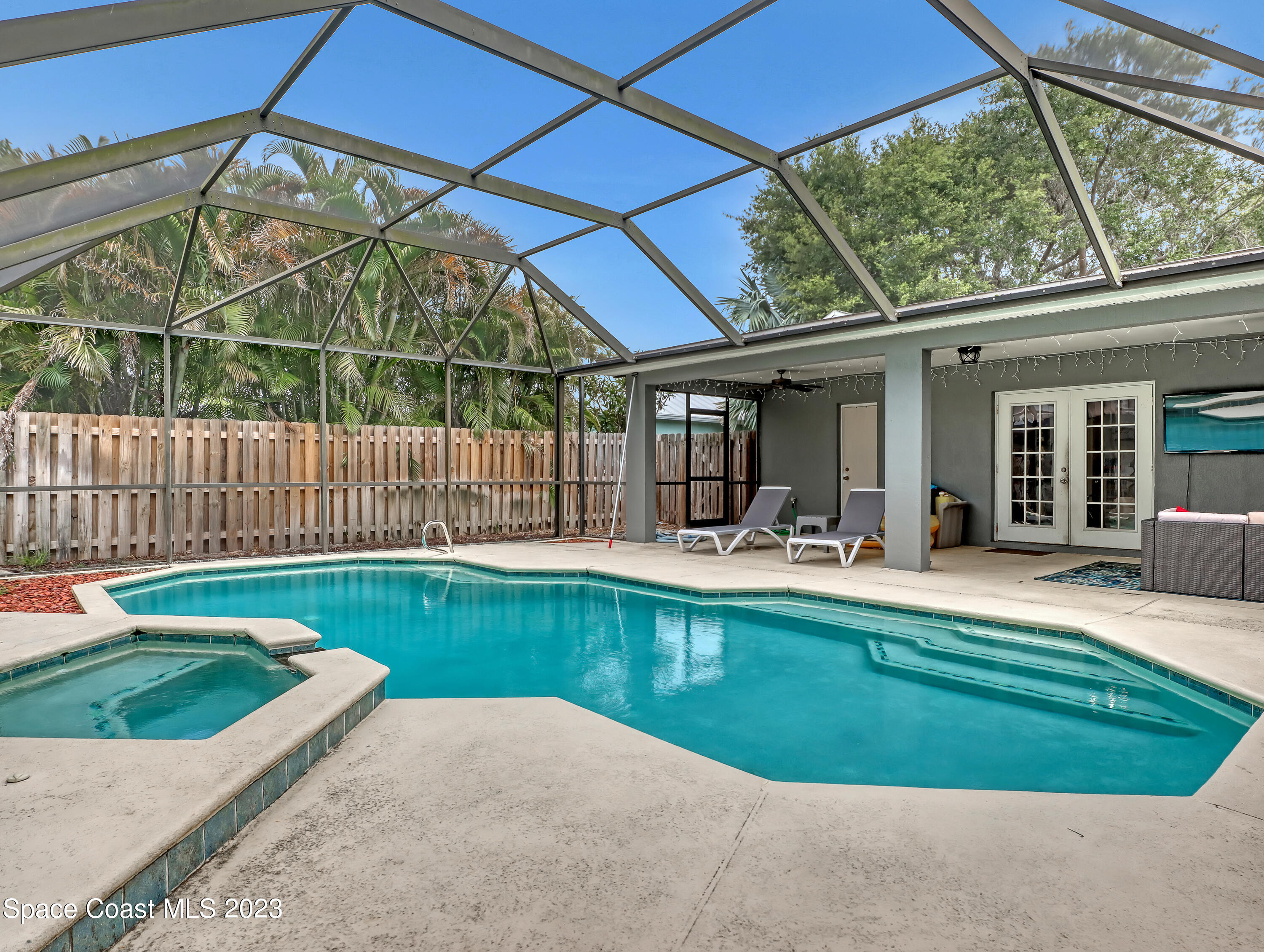 2305 Shady Oak Road Melbourne, FL 32935 - Photo 34 of 38 a view of swimming pool with a patio