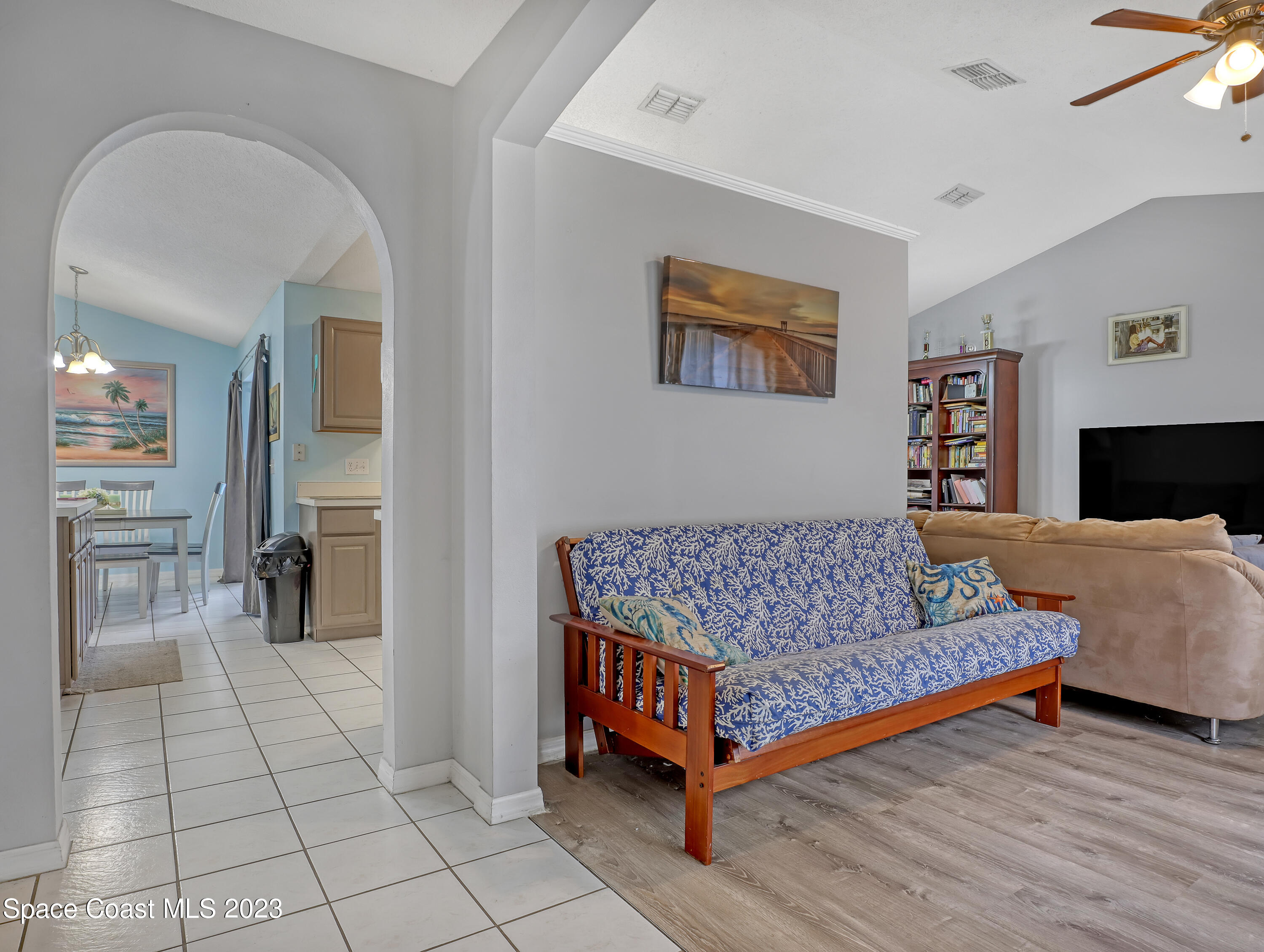 2305 Shady Oak Road Melbourne, FL 32935 - Photo 5 of 38 a bedroom with a bed and a view of bedroom