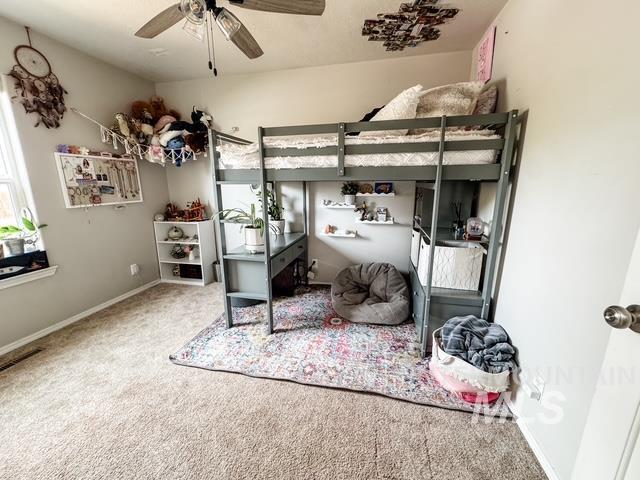 808 O'Leary Way Twin Falls, ID 83301 - Photo 24 of 37 Carpeted room featuring a ceiling fan, a window with natural light, and light gray wall paint