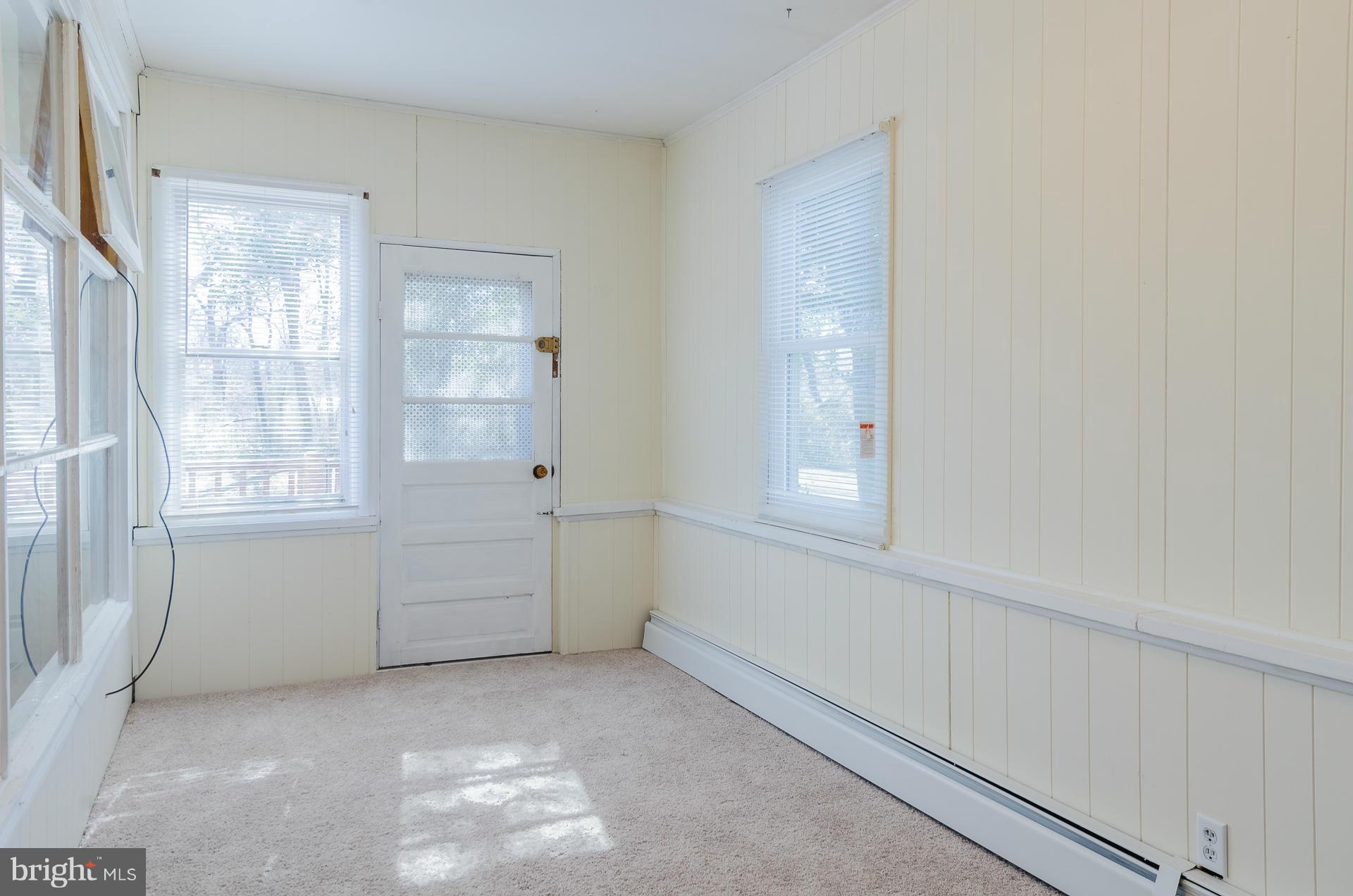 8707 Downey Road Severn, MD 21144 - Photo 12 of 29 Enclosed Porch