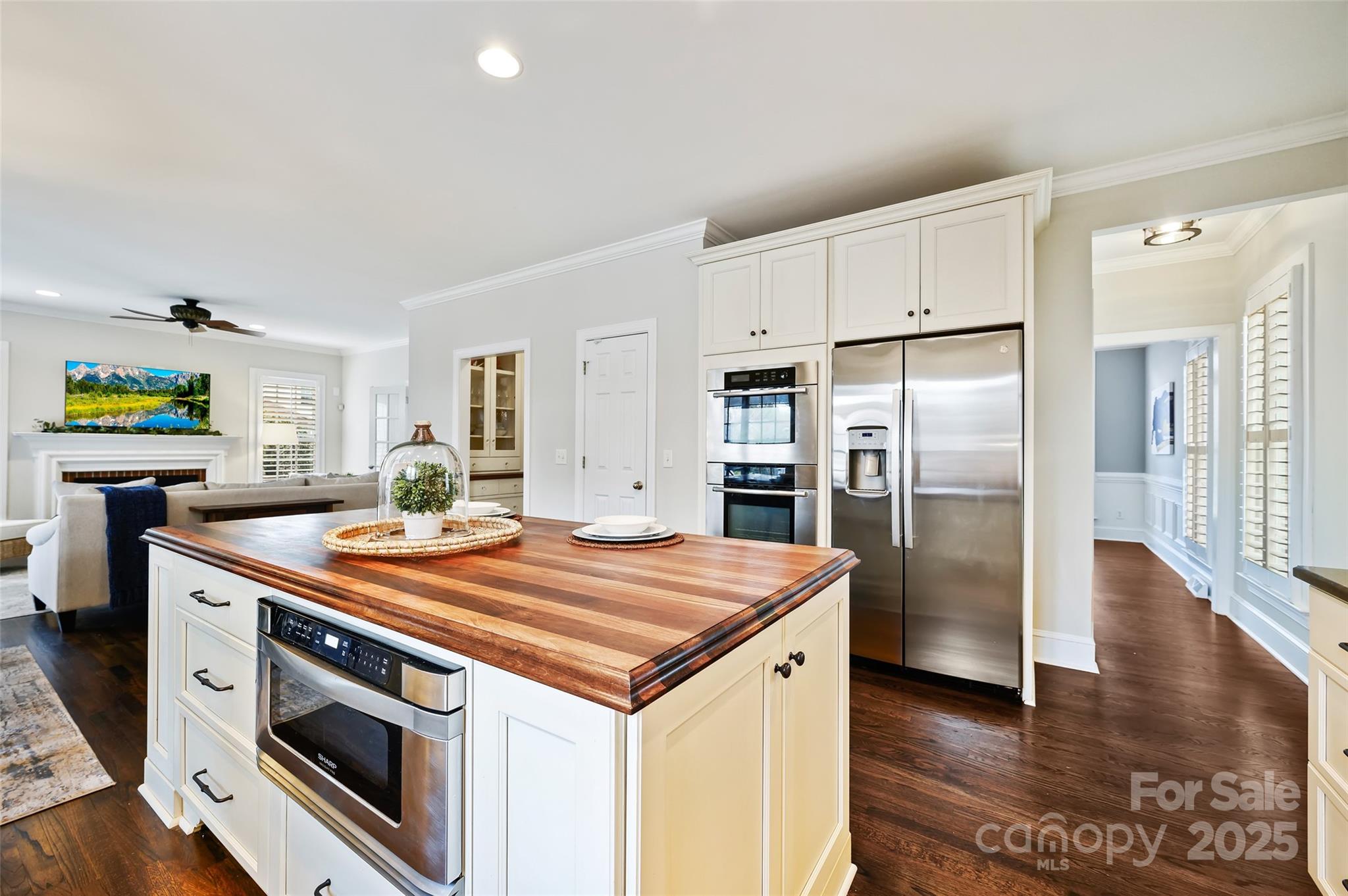 7704 Sharpthorne Place Charlotte, NC 28270 - Photo 11 of 34 a kitchen with stainless steel appliances granite countertop a table and chairs