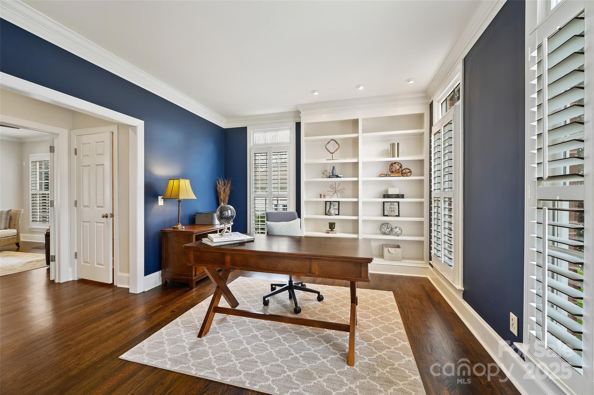 7704 Sharpthorne Place Charlotte, NC 28270 - Photo 18 of 34 a view of a workspace with furniture and a window