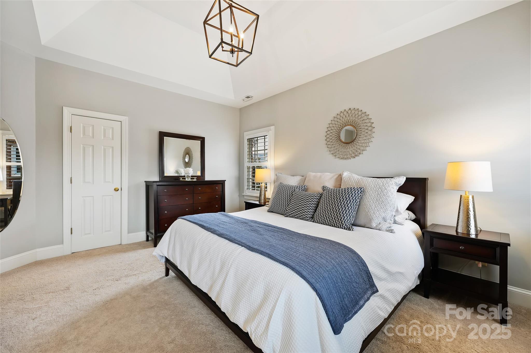 7704 Sharpthorne Place Charlotte, NC 28270 - Photo 20 of 34 a bedroom with bed and a night stand