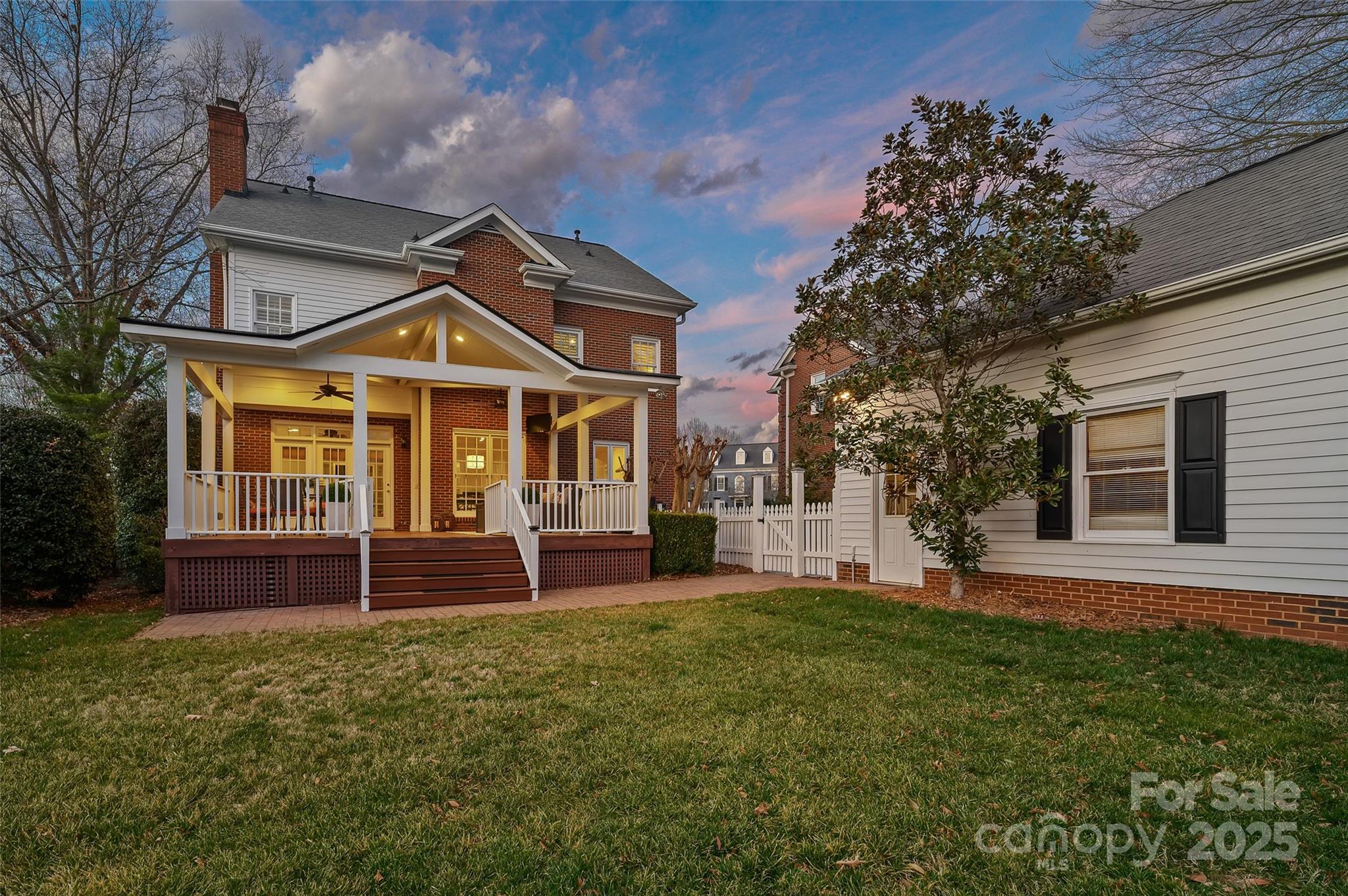 7704 Sharpthorne Place Charlotte, NC 28270 - Photo 2 of 34 front view of a house with a yard